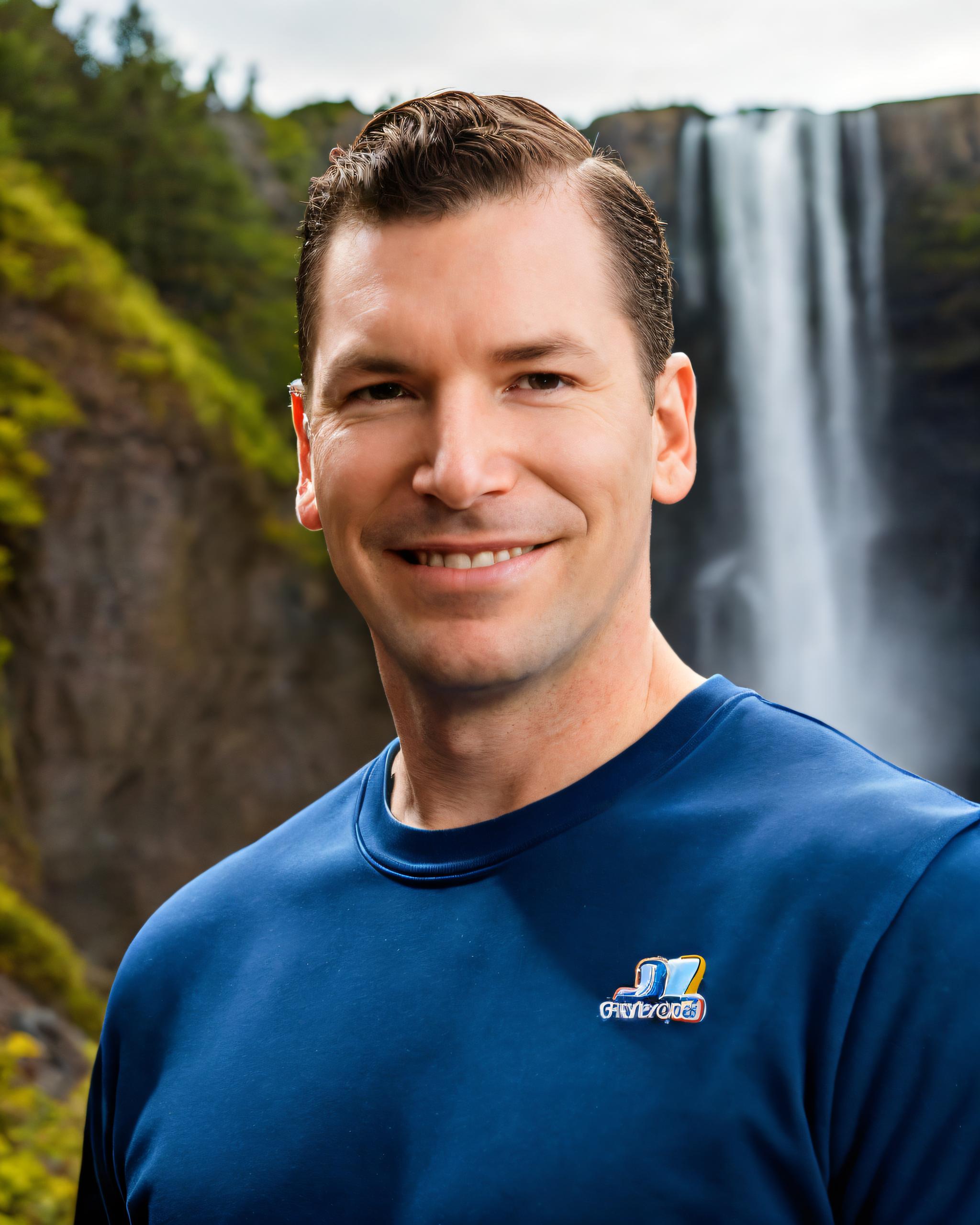 Neil Colvin at a waterfall, explaining what to look for when searching for a marketing agency near me.