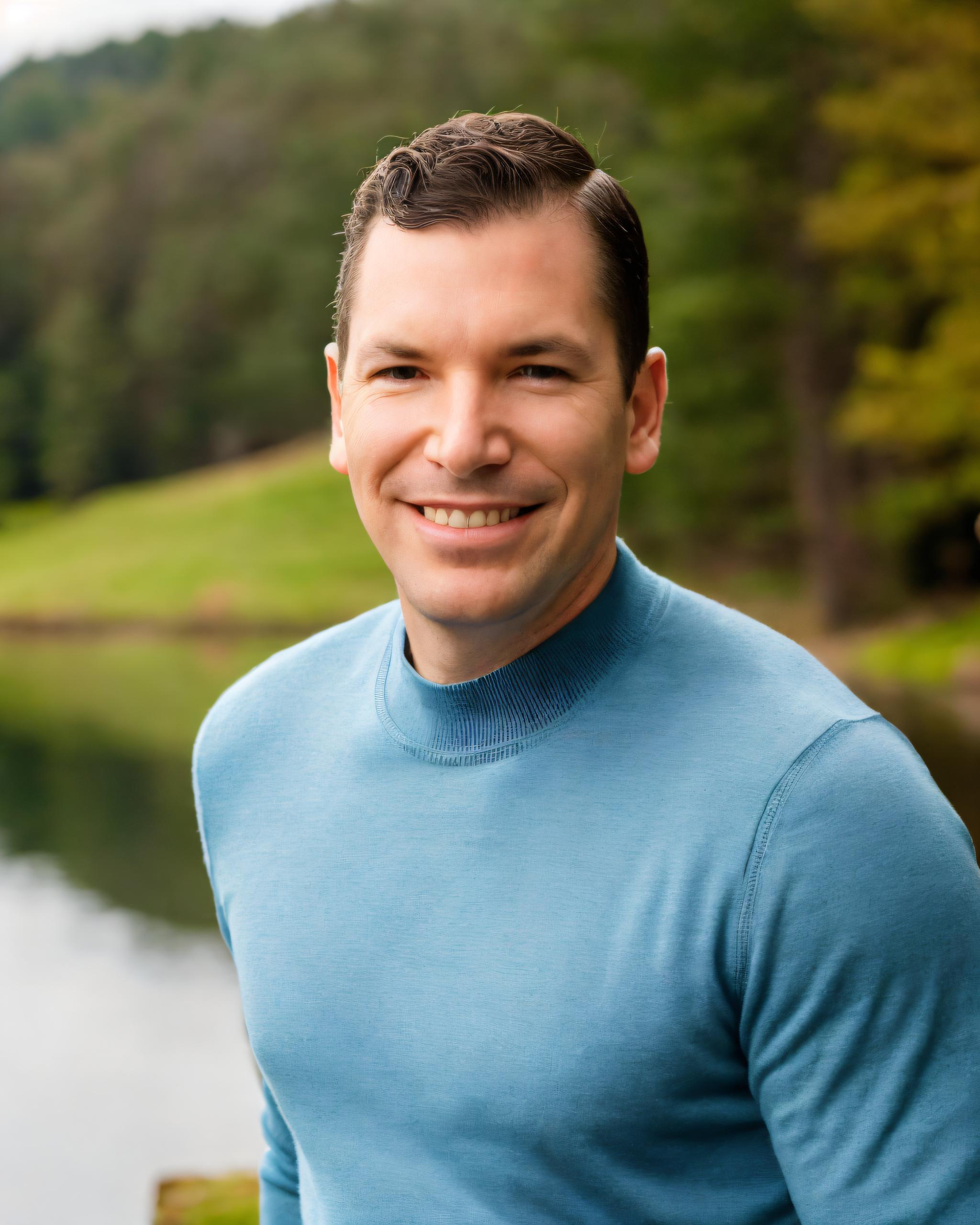 Automated bidding in Google Ads explained by Neil Colvin while hanging out at a lake.