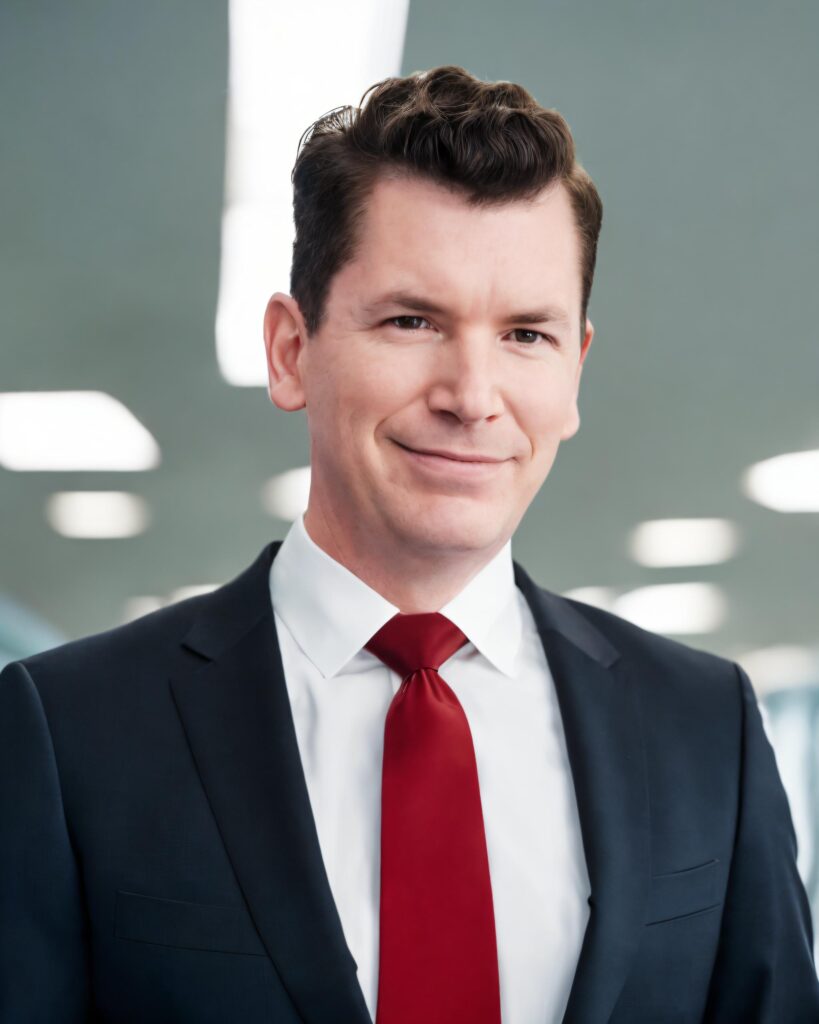 What Is a Business Category Key Facts for Google Business Beginners Discussed by CEO of Columbus Marketing Experts, Neil Colvin in a dark blue suit, white shirt and red tie.